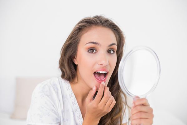 The Mouth Mirror: Unlocking Secrets of Your Overall Health Through Your Teeth